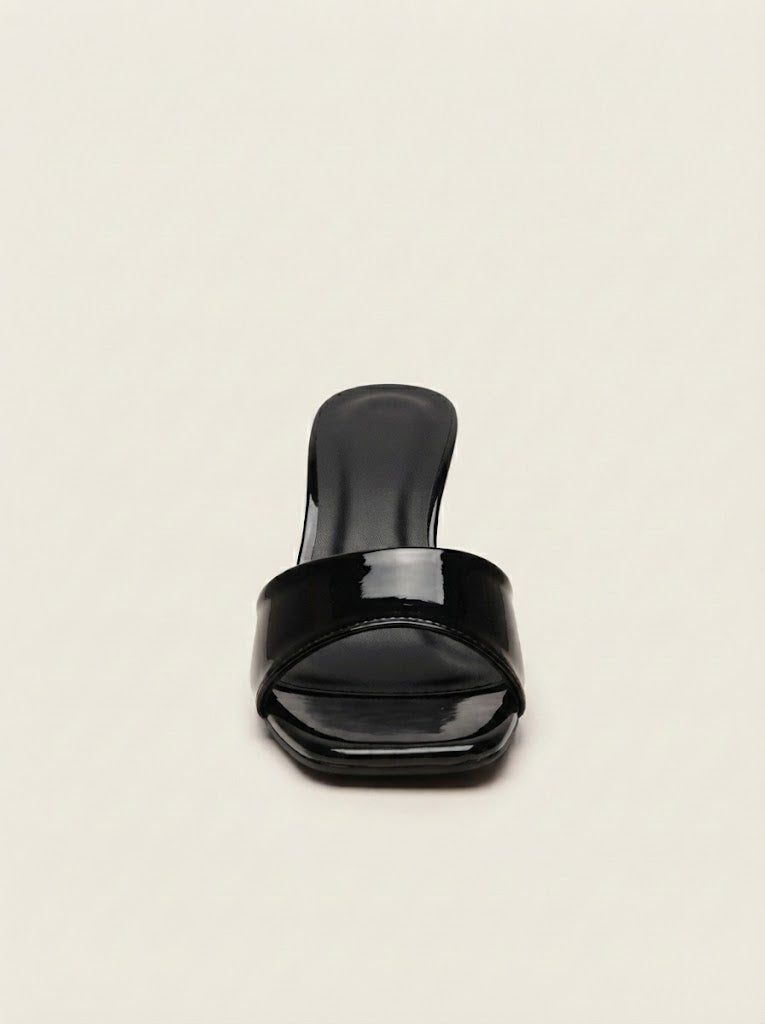 A polished silver hanger-shaped charm with a textured finish, shown on a plain white background.